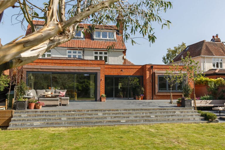 Large open plan kitchen extension with sliding doors