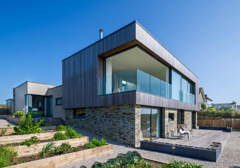 Open corner sliding doors with panel sliding into pocket in the wall at the Stonehouse in Cornwall