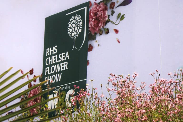 RHS Chelsea Flower Show logo on side of show pavillion