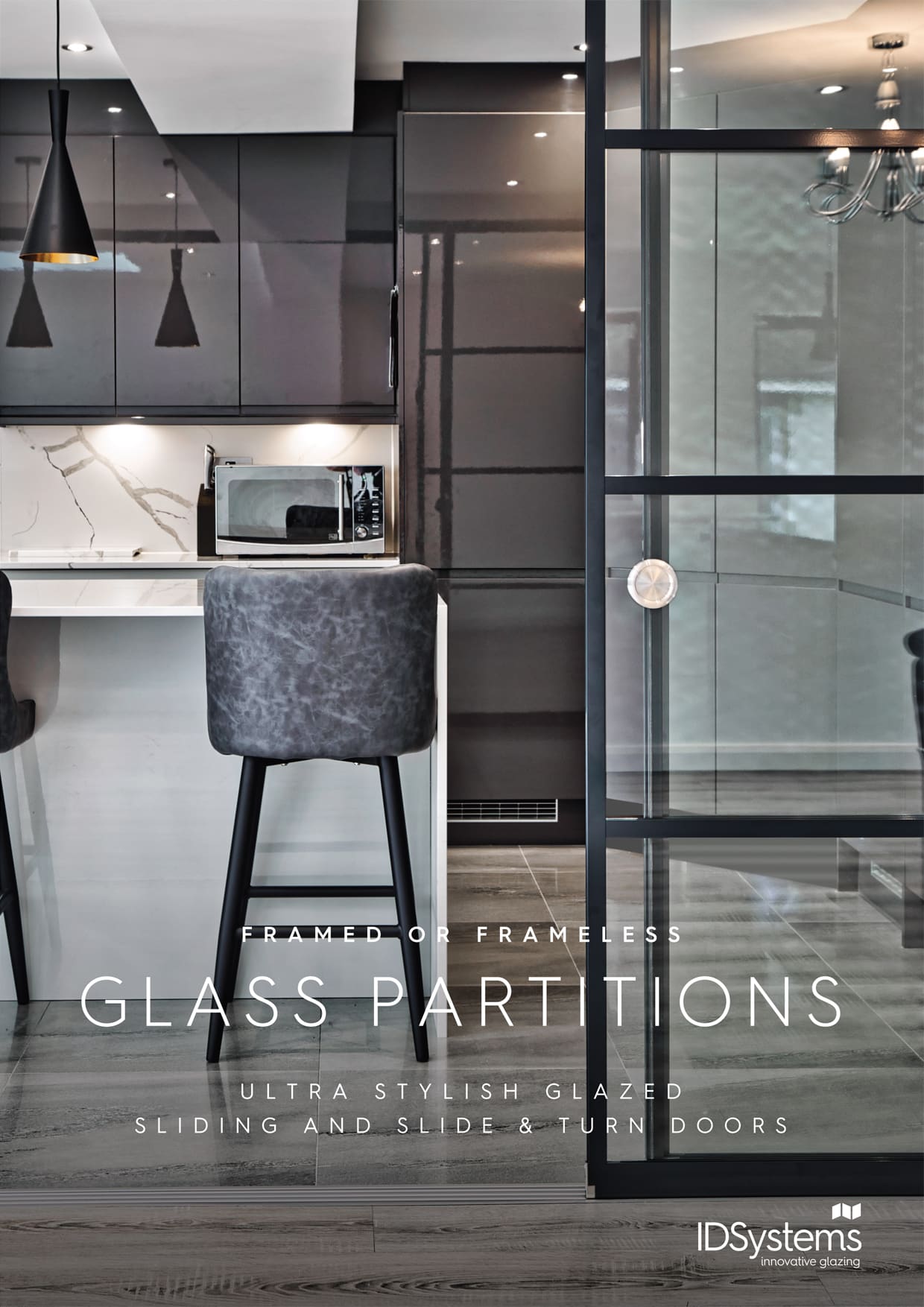 Modern kitchen with glossy cabinetry and an island, featuring a black framed glass partition. A gray barstool is positioned at the island. Text reads: