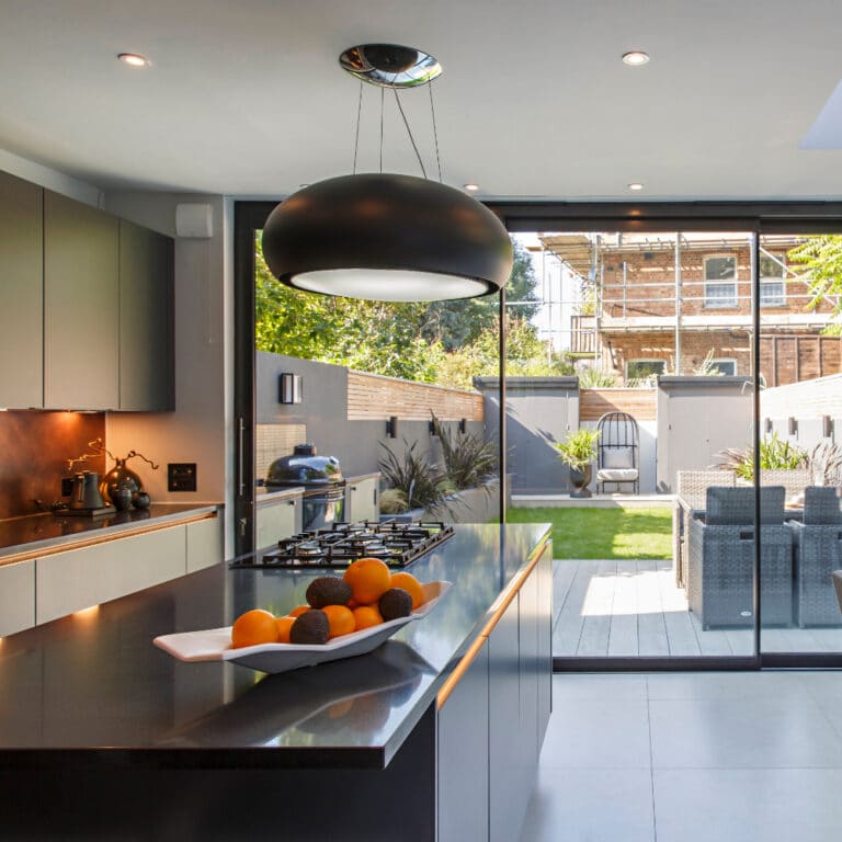 Modern open plan kitchen extension in Hackney with theEDGE2.0 sliding doors