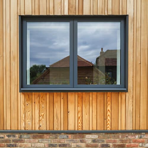 theVISION aluminium window with two top-hung sashes