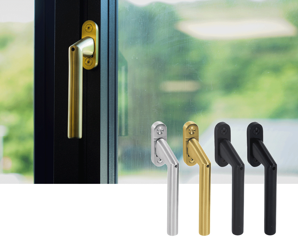 Brass effect window handle on an aluminium casement window with a black frame