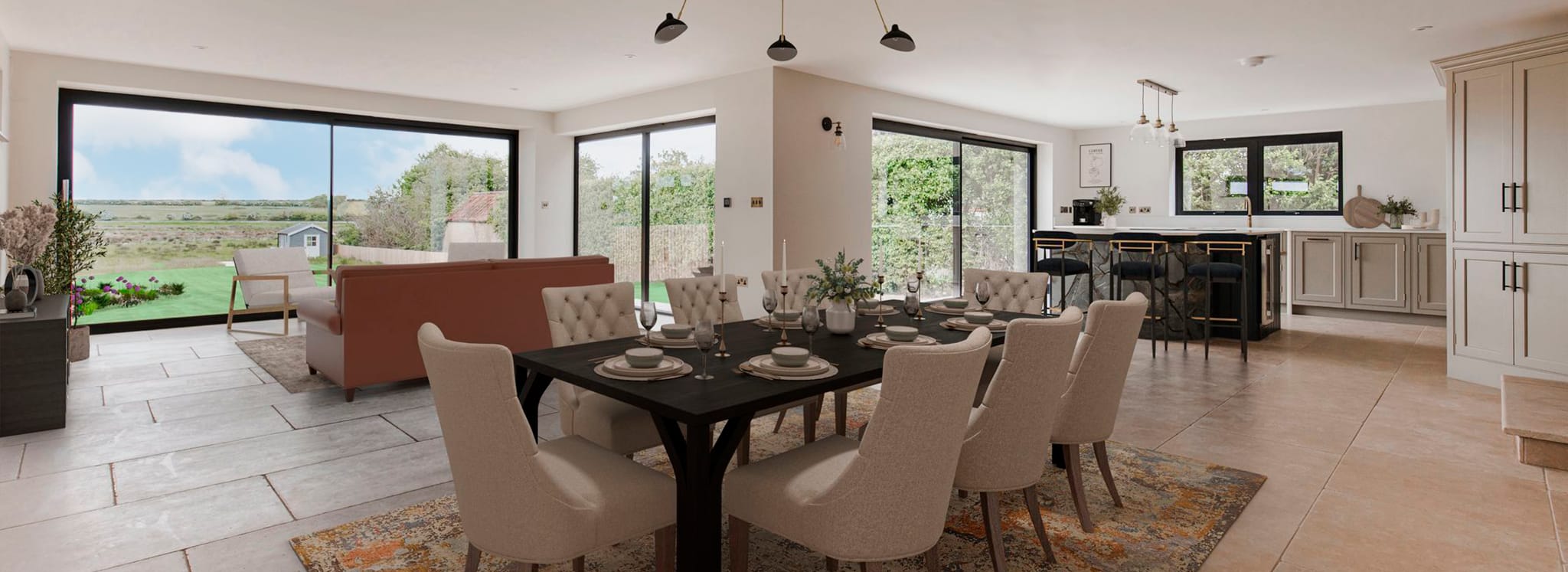 Spacious open-plan living room showcasing sliding glass doors and bifold doors opening onto countryside views and garden.